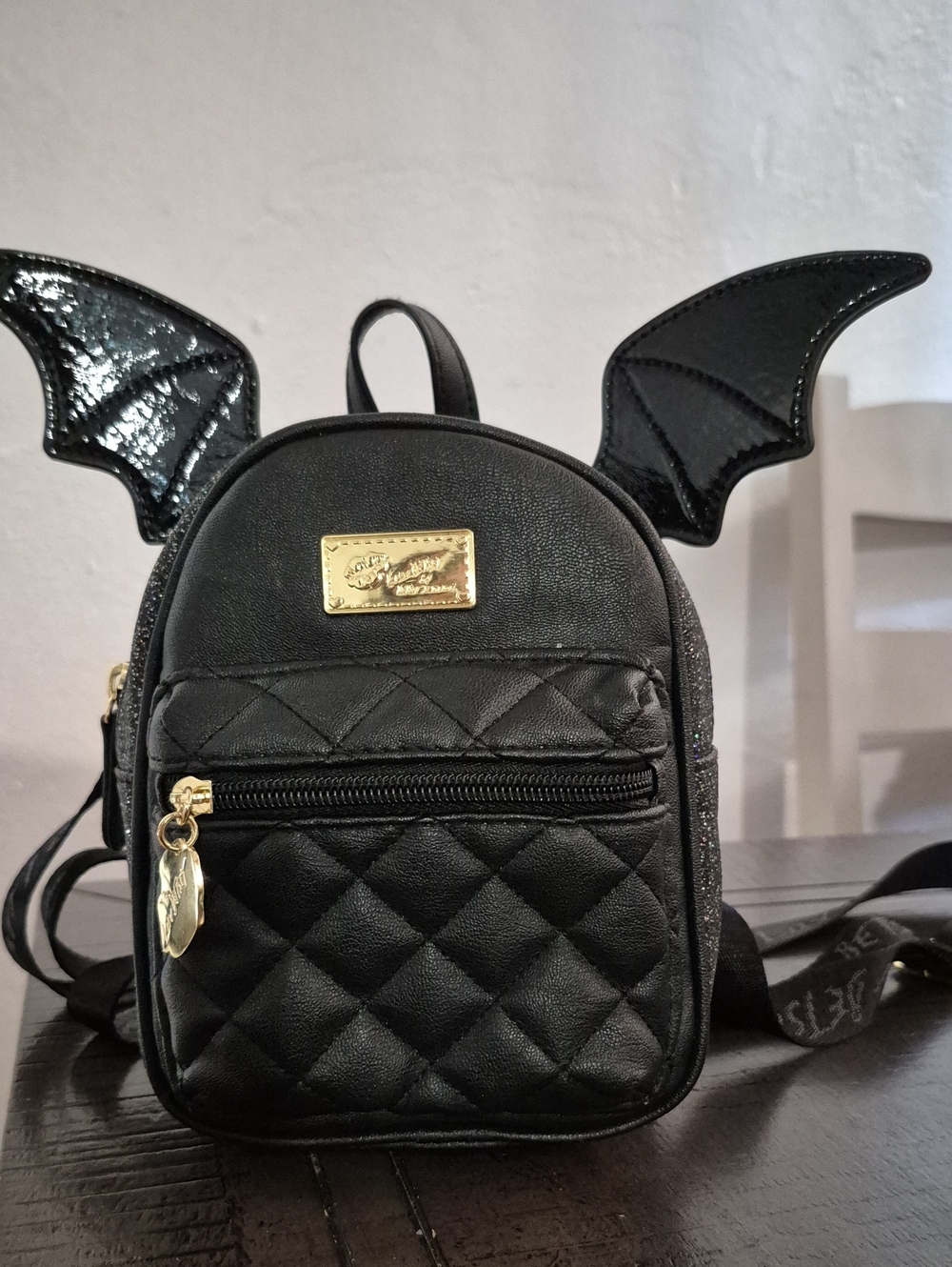 Betsuly Johnson Black Bat Wing Mini Backpack with Gold Plate, Glitter Sides